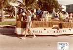 Maids-a-Milking float in the Boynton Beach Florida holiday parade, 1982